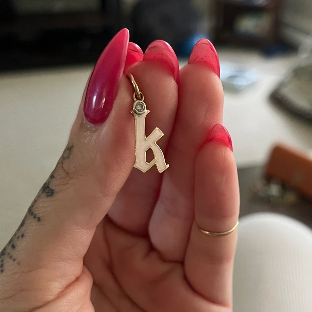 Diamond, gold and enamel gothic initial pendant